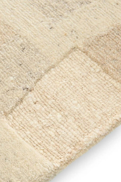 Tapis en laine beige noué à la main