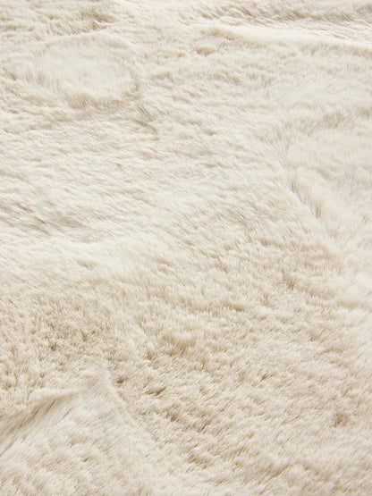 Tapis en fausse fourrure lavable