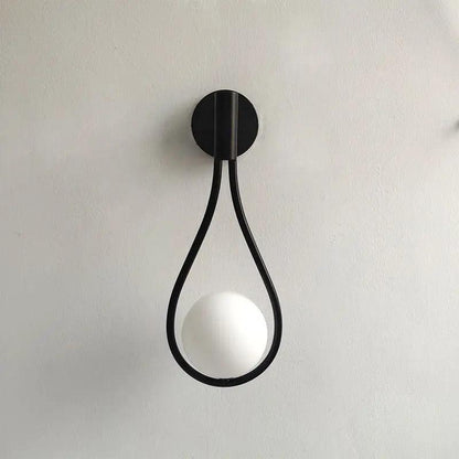 Applique murale globe en fer en forme de goutte Orvenna