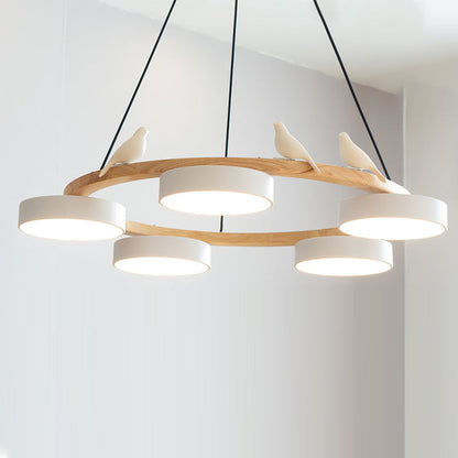 Lustre rond en bois avec oiseaux