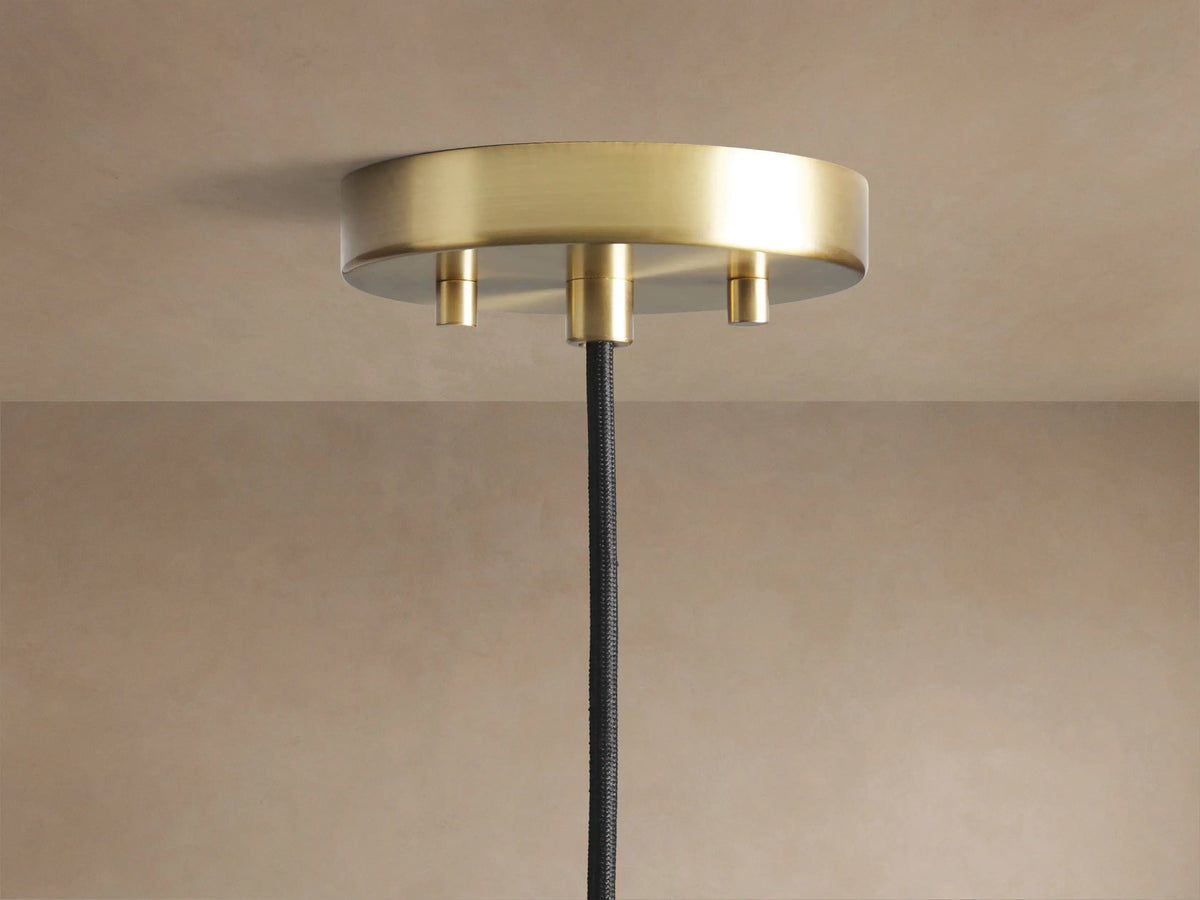 Suspension globe en verre texturé avec graines