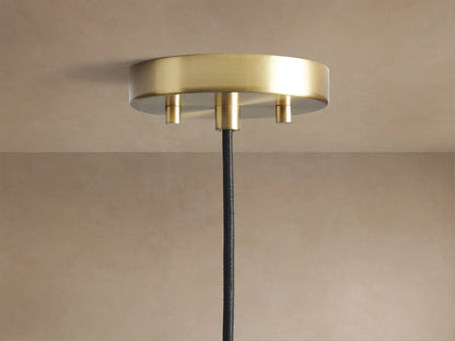Suspension globe en verre texturé avec graines