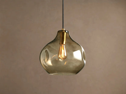 Suspension globe en verre texturé avec graines