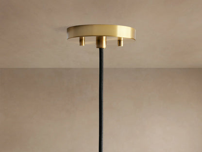Suspension globe en verre texturé avec graines