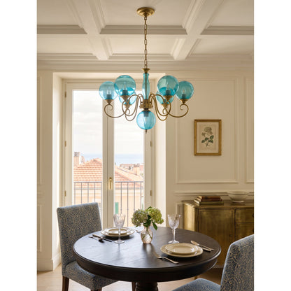 Lustre globe en laiton sculpté