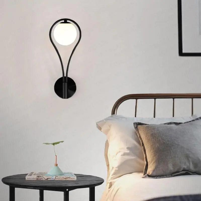 Applique murale globe en fer en forme de goutte Orvenna