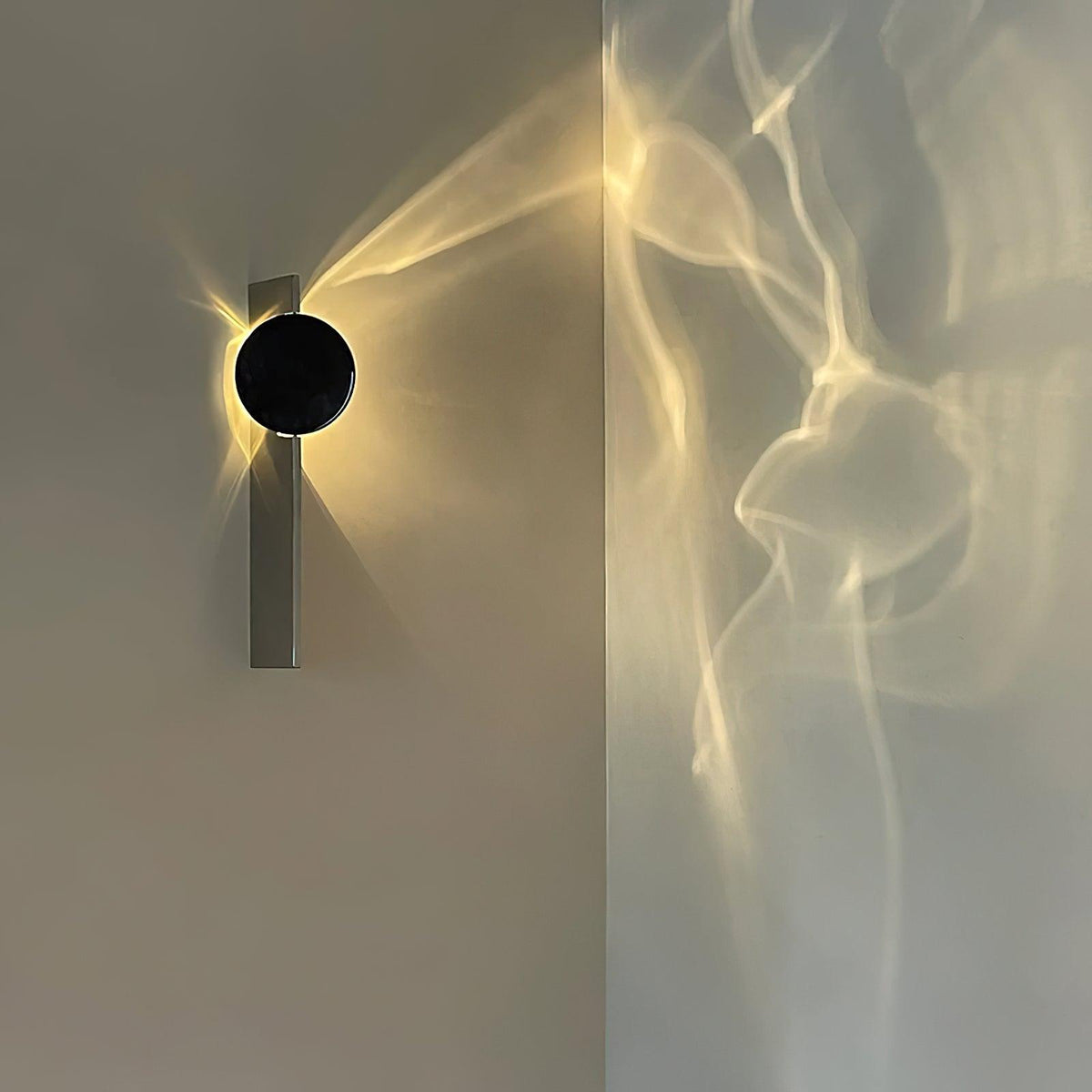 Applique murale sculpturale à disque miroir