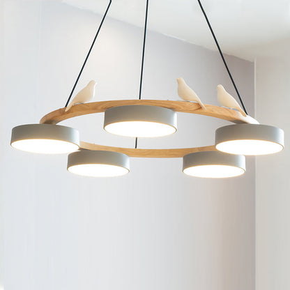 Lustre rond en bois avec oiseaux