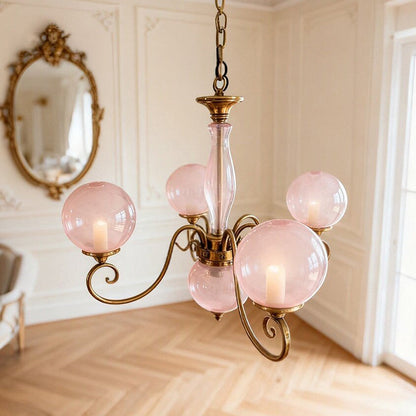 Lustre globe en laiton sculpté