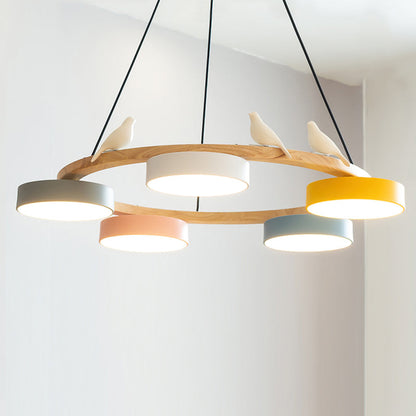Lustre rond en bois avec oiseaux