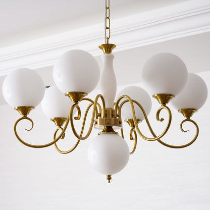 Lustre globe en laiton sculpté