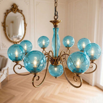 Lustre globe en laiton sculpté