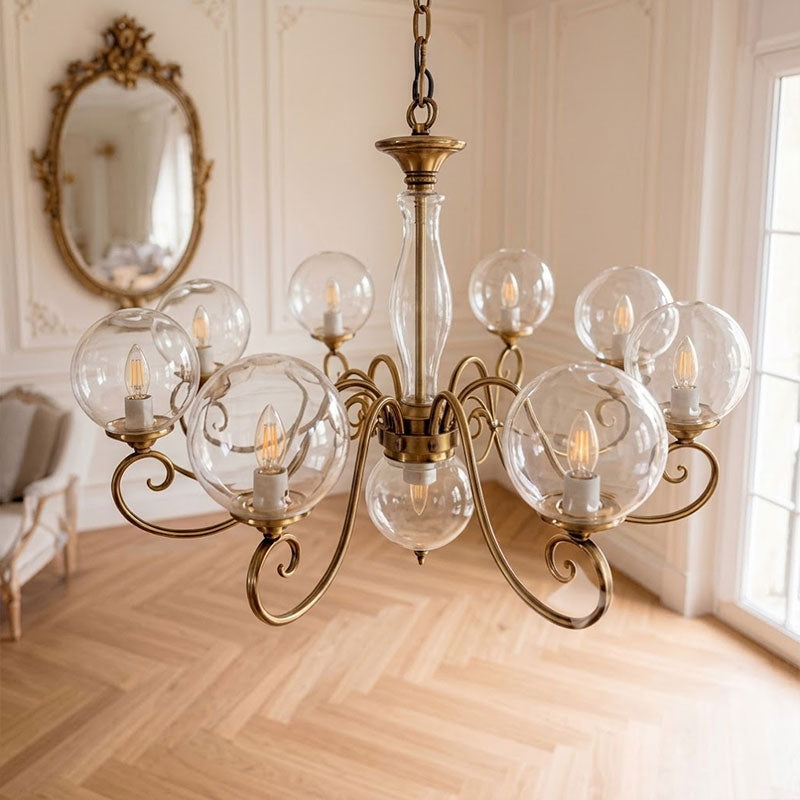 Lustre globe en laiton sculpté