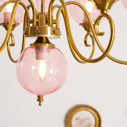 Lustre globe en laiton sculpté