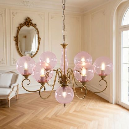 Lustre globe en laiton sculpté