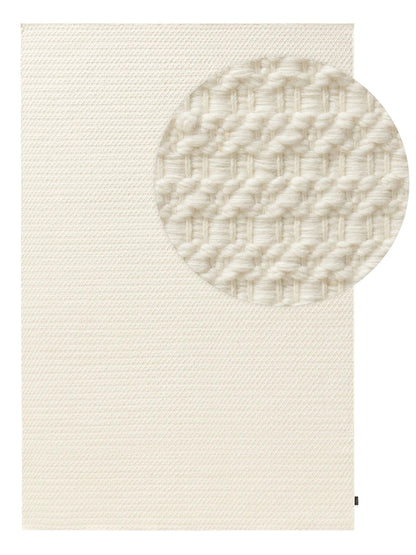 Handwoven wool rug texture