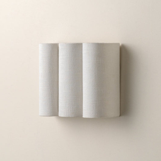 Applique murale en lin festonnée